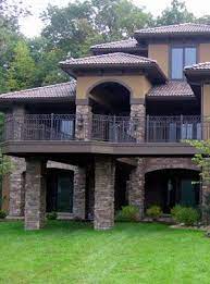 Faux Stone Siding Man Made Stone Cladding Exterior House Designs Engineered Stone Cladding Cladding Material And S House Exterior House Design Stone Siding