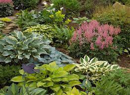Inspiration for a traditional shade stone landscaping in boston. Shade Garden Design Tips Garden Gate