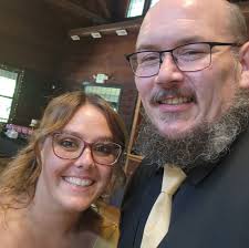 Who can cut the grass at my rental property in Michigan City?