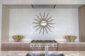 Cooking Alcove With Gray And Gold Sunburst Mirror Over Stove Cottage Kitchen Gold Sunburst Mirror Sunburst Mirror Gold Sunburst