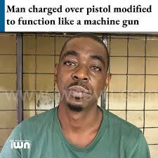 A man who was allegedly nabbed with a semi-automatic pistol that was  modified to function as a fully automatic gun has been granted EC$20,000  bail and his trial set for Jan. 9,