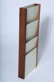 Choice of colors and wood trim finishes. Wall Mount Magazine Holder By Peter Pepper Products At 1stdibs