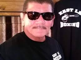 A familiar figure in East LA's boxing rings loses his bout with COVID