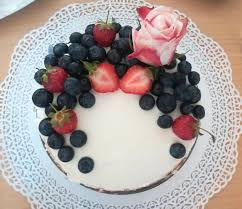No more boxed cake mix or artificial flavor with this perfect recipe! Homemade Birthday Cake With Blueberries And Strawberries As Decoration Food