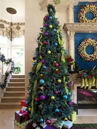 Celebrity Holiday Homes Peek Inside Festive Star Studded Spaces Colorful Christmas Decorations Peacock Christmas Tree Christmas Tree Themes