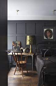 Eclectic Modern Bedroom With Matte Black Painted Walls Vintage Paintings A Ram Skull And Antique Brass Lamp And Sha House Interior Home Decor Dark Interiors