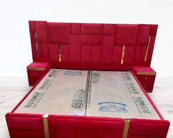 Red quilted double bed with storage box