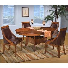 Our exclusive beartooth pass aspen collection features gnarly aspen logs harvested by hand in the rocky mountains near laramie wyoming. 40 116 11 New Classic Furniture Aspen Round Dining Table