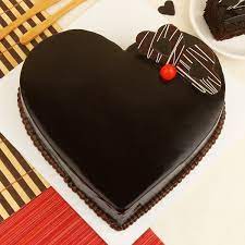 White chocolate mud cake with white chocolate and dark chocolate ganache. Heart Shaped Chocolate Cake