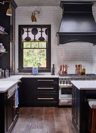 Black And Gold Kitchen Don T Be Afraid To Mix Metals In The Kitchen Kitchen Design Trends Black Appliances Kitchen Kitchen Remodel