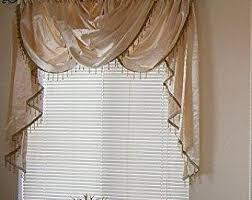 A waterfall valance is a special window treatment that drapes down to resemble a waterfall and can give your windows a refined appearance. Waterfall Valance Etsy