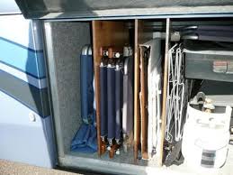 24 Easy Rv Organization Tips Rvshare Com Rv Storage Solutions Rv Living Organization Camper Storage