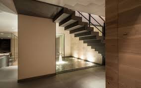 Having water feature, a small pond like structure, right below modern staircase is yet another way of bringing this natural element right into your home. Benefits Of Indoor Fountain