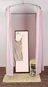Two girls are having a private talk in a dressing room. Semicircle Changing Room Kit Quick And Easy Push Pin Assembly