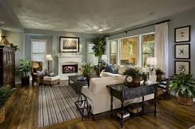 This living room shows the owner's style with the choice of sofa, lamp, painting, chair and plant as well as the shag rug. Small Apartment Living Room Ideas On A Budget