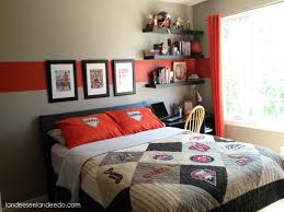 The masculine bedroom above looks modern with wood flooring, modern furniture especially bedding, round glass coffee table, and very cool wall decor with its contemporary. Young Man Bedroom Decorating Ideas Men Atmosphere Color Colors Rich Black Sport Team Gamer Apppie Org