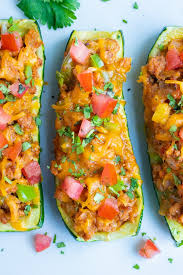 You'll totally forget about the tortilla when you try these mexican taco zucchini boats! Mexican Taco Stuffed Zucchini Boats Evolving Table