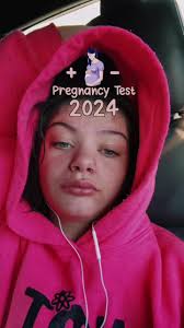 Inside a Car: Revealing a Pregnancy Test Result