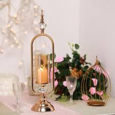Candle holders might not be the most important element ever created but they can be a nice addition to the overall interior design. 22 Tall Gold Hurricane Votive Metal Candle Holder With Glass Tube And 2 Diamond Crystals In 2021 Metal Candle Holders Crystal Candle Holders Centerpieces Candle Holders
