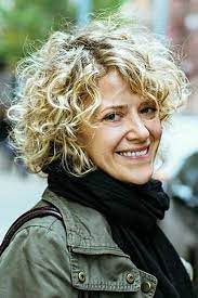 While there are longer sections of hair near the face, you can cut a few shorter pieces to create curtain bangs. Bob For Naturally Wavy Hair Novocom Top