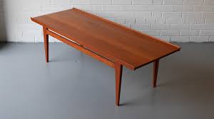 Whether you're looking for an older or newer 1950s teak coffee table, there are earlier versions available from the 20th century and newer variations made as recently as the 21st century. Finn Juhl For France Son Solid Teak Coffee Table C 1957 Coffee Table Teak Coffee Table Table