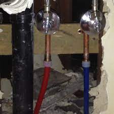 Pex plumbing under kitchen sink. Pex Repiping In Los Angeles Repiping Specialists