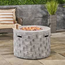 Set the first course of stone into the hole. Dino 31 75 Lightweight Circular Concrete Gas Fire Pit Christopher Knight Home Target