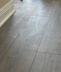 Karndean stone floor tiles have transformed the rooms feeling lighter, cleaner and have a wow factor. Aquaguard Laminate