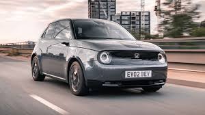 The honda e changes that with a retro theme that should attract buyers, while helping the car stand out in an increasingly crowded electric city car segment. 2020 Honda E First Drive Review Electrified Object Of Desire