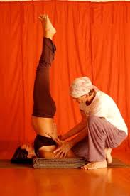 Assisting A Pregnant Student In Salamba Sarvangasana Supported Shoulder Stand Modified With Blankets Teaching Yoga Shoulder Stand Meditation Practices