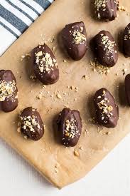 Chocolate Covered Snickers Stuffed Dates Eating Bird Food Recipe Food Date Recipes Desserts Chocolate Covered