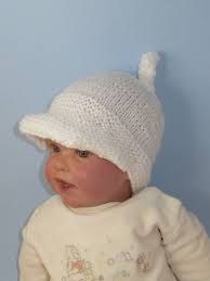 Shop the latest new this week at end. Baby Peak Cap Topknot Beanie07 Madmonkeyknits Knitting Patterns Peaked Cap Baby Knitting Baby Cap