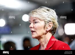 United States Secretary of Energy Jennifer Granholm (2nd L) with members of  her family looks