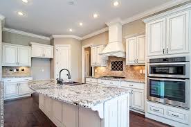Liz morrow 's small kitchen is given space and depth with white up top for the backsplash and cabinets and deep charcoal, almost black, down below. White Kitchen Open Floor Plan Instaimage