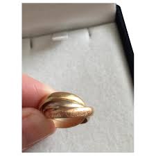 Maybe you would like to learn more about one of these? Cartier Trinity Ring Gold Hardware Gold Ref 279556 Joli Closet