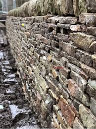 You begin building at the end, known as the quoin or cheekend. Engineers Retaining Walls Dry Stone Retaining Walls Gravity Walls Revetments Stonemason Stonework Restoration Lime Pointing Dry Stone Waller