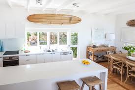 For example, a set of barstools in striped upholstery will. Coastal Modern Beach House Kitchen Novocom Top