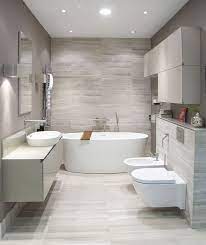 Ideas for making a small bathroom look bigger or creating more space in a small bathroom. Modern Bathroom Design Modern Bathroom Small Bathroom Remodel