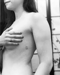 It's not a large tattoo design, it fits elegantly in a horizontal pattern. Inspirational Quote Tattoos On The Ribcage