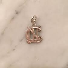 Maybe you would like to learn more about one of these? Petite Ncl Open Logo Charm Stud Earrings Open Logo Belly Button Rings