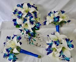 It was perfect for my galaxy theme! Pre Made Set Of White Lilies And Blue Galaxy Orchids Free Delivery