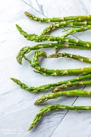 Instead, use a knife to cut off the bottoms of the spears, then peel the tough outer skin. How To Trim Asparagus Longbourn Farm