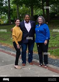 From left, Suzanne Brick, special assistant, Mission Operations, Office of  the Secretary of Veterans Affairs, Luis R. Clemente, and Sara Hogan, senior  development manager, Marine Corps Heritage Foundation, pose for a photo