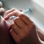  Children's deaths from flu rise sharply amid signs that season may be hitting plateau