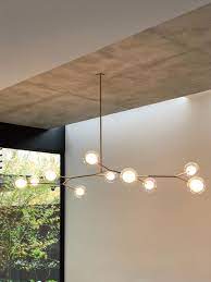 Two open rectangles decorate and support the long horizontal integrated led light that hangs from adjustable downrods. Branchbubble 10 Gold Ii Jpg Kitchen Island Lighting Island Lighting Mid Century Modern Lighting