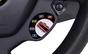 Wheel base featuring the 'bungee cord' mechanism, offering linear resistance (automatic centering system patented by thrustmaster) adjustable wheel sensitivity. A Review Of The Thrustmaster Ferrari 458 Italia Steering Wheel