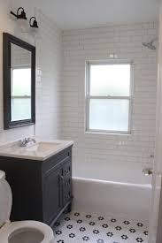 Black And White Bathroom Tiles In A Small Bathroom Farmhouse Style Bathroom Remodel White Subway Tile Shower Gray Vanity Black And Wh White Subway Tile Bathroom White Bathroom Tiles Small Bathroom Remodel