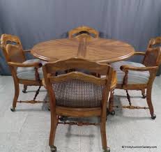 Lot 189 Round Oak Dining Table With 4 Chairs On Casters Round Oak Dining Table Dining Table Outdoor Chaise Lounge Chair