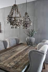 Gather round this beautiful light gray table with farmhouse flair for a grand dinner or an everyday meal. A Place For My Home Afscheid Nemen Grey Dining Room Home Decor Reclaimed Wood Dining Table