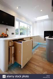 a modern white kitchen inside a home in
